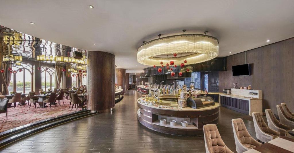 Maison New Century Hotel Dongguan Dongguan  Dış mekan fotoğraf