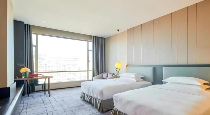 Maison New Century Hotel Dongguan Dongguan  Dış mekan fotoğraf